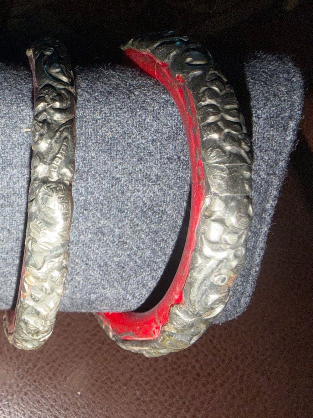 Pair Handcrafted Textured Tibetan Silver Bangle Bracelet on red resin